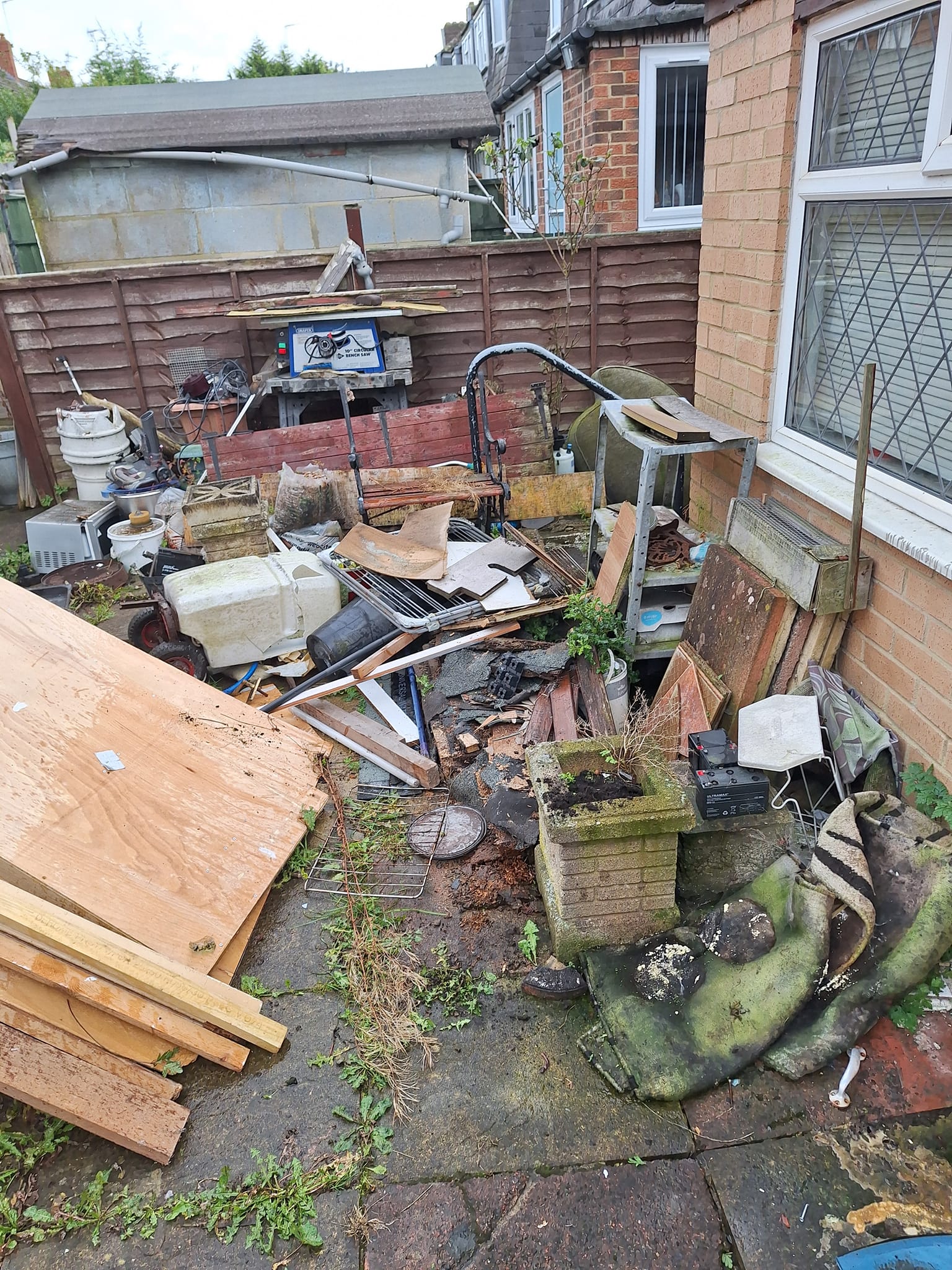 tiling grounds to have waste, rubble and planks removed